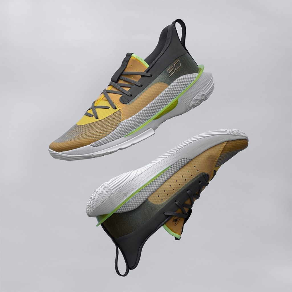 Curry Brand basketball shoes floating in studio setup